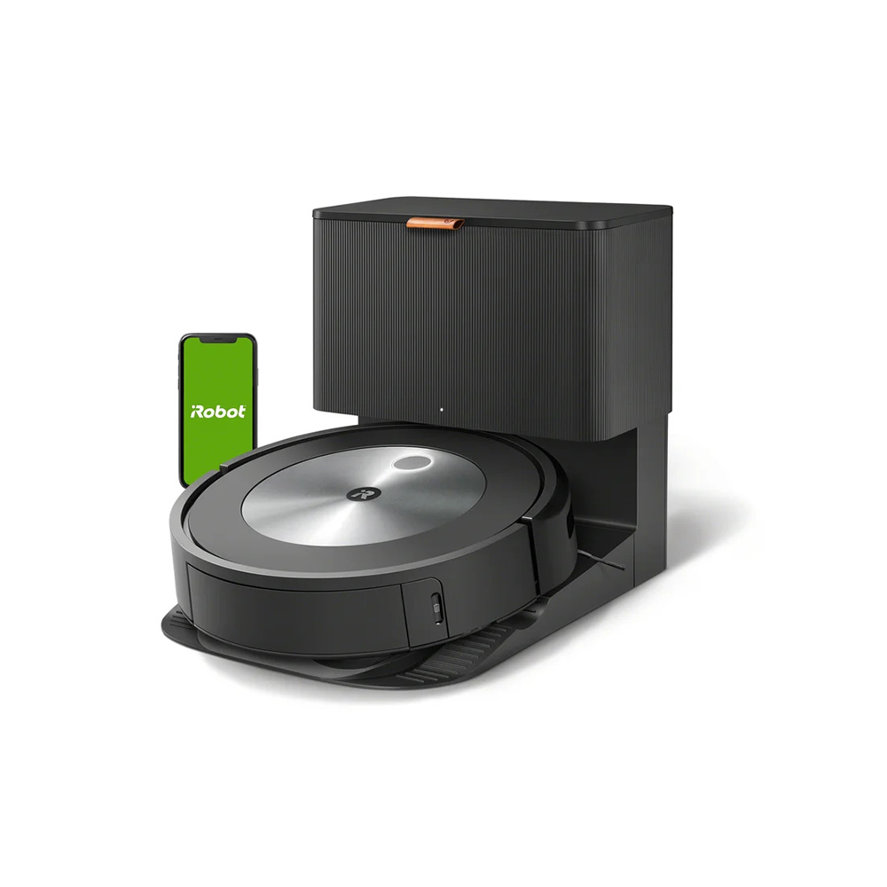 Aspirateur Roomba et station d'accueil avec téléphone sur fond blanc