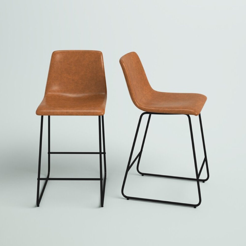Tabouret de bar et de comptoir Luca marron clair (ensemble de 2) avec pieds noirs sur fond gris