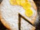 Almond cake recipe with lemon and a slice removed
