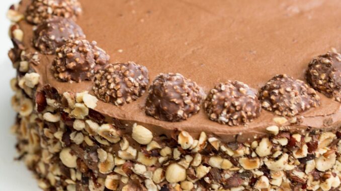 Ferrero Rocher Cake on a cake platter